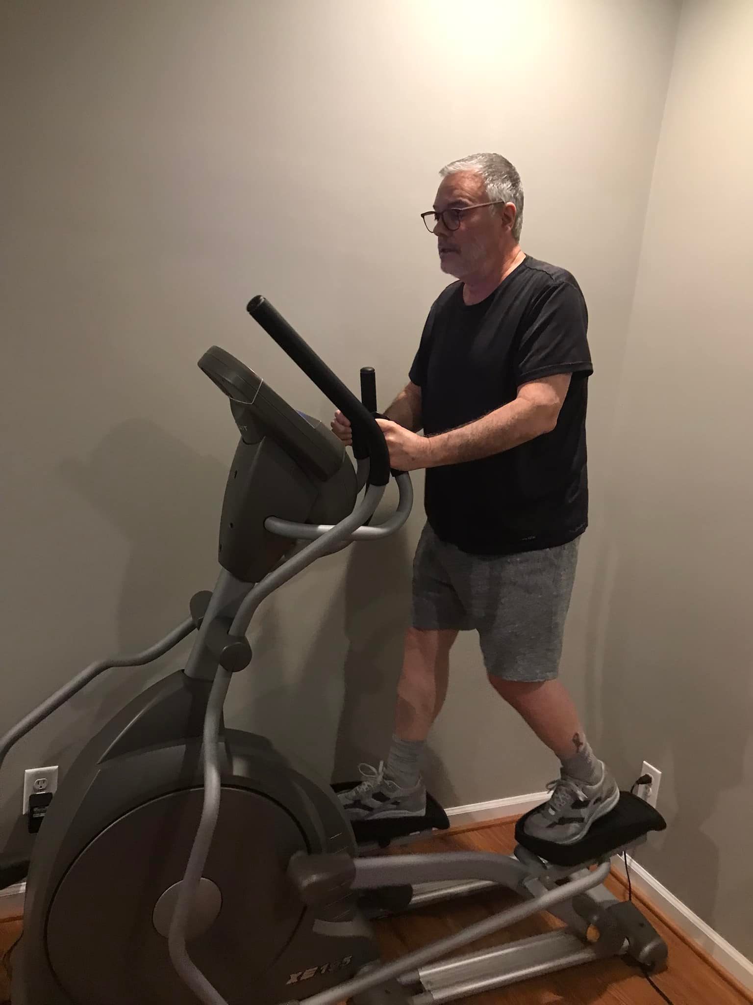 Me on our home elliptical machine